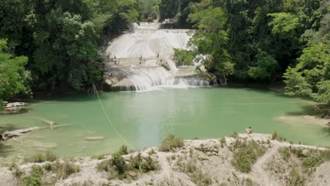 Aerial-is-tilting-upwards-showing-beautiful-Roberto-Barrios-Waterfalls-and-Pools-in-Palenque-Chiapas,-Mexico