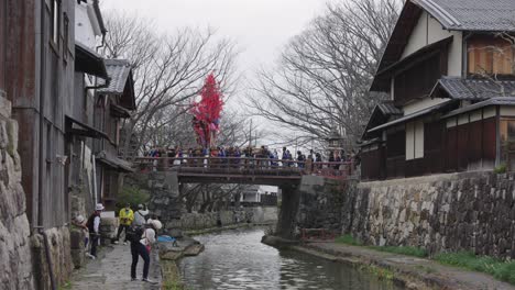 Sagicho-Float-Carried-over-Bridge-at-Hachiman-Moat-during-Festival