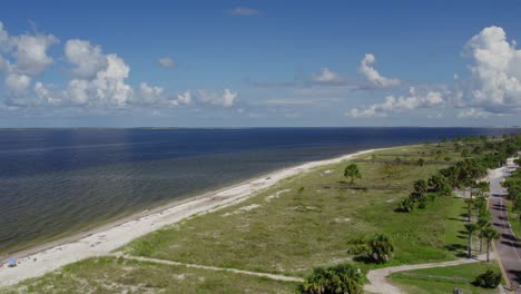 Aerial-flight-along-Windmark-Beach,-Gulf-of-Mexico-in-panhandle-of-Florida