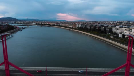 Slow-reveal,-establish-aerial-of-Budapest-between-two-bridge-poles