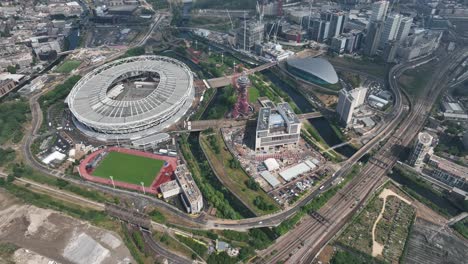 Aerial-fly-drone-bird-eye-view-of-Queen-Elizabeth-Olympic-Park,-Premiere-league-cup-team-West-Ham,-London-Stadium