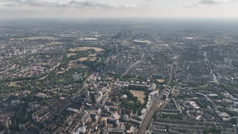 Establishing-Aerial-fly-drone-View-of-Gherkin-skyscraper-with-London-Skyline,-20-Fenchurch-or-Walkie-Talkie,-sky-garden-by-the-Thames-River,-United-Kingdom,-Europe