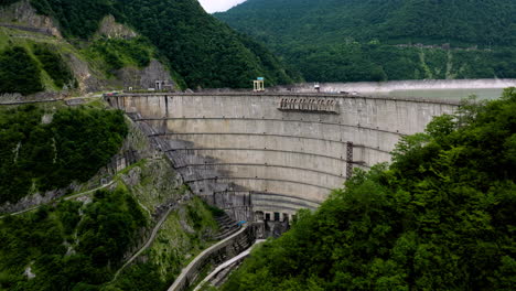 Enguri-Dam,-A-Hydroelectric-Dam-On-The-Enguri-River-In-Tsalenjikha,-Georgia---aerial-drone-shot