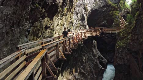 Walkbridges-in-a-gorge-surrounded-by-waterfalls-in-Austria