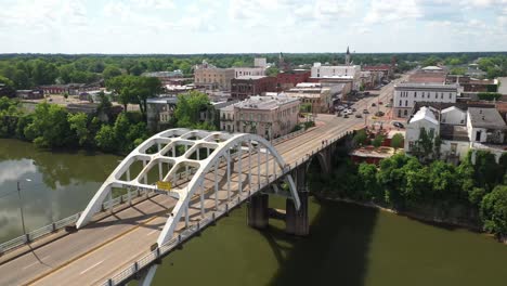Edmund-Pettus-bridge-in-Selma,-Alabama-with-drone-video-moving-up-to-skyline