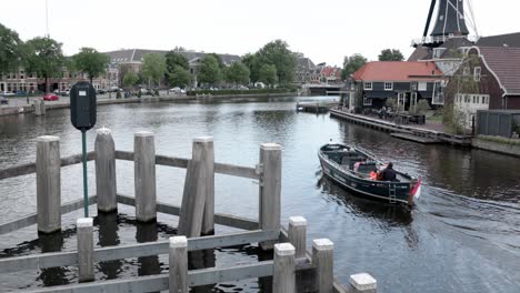 Boat-taxi-transporting-tourists-on-the-river-in-the-Netherlands