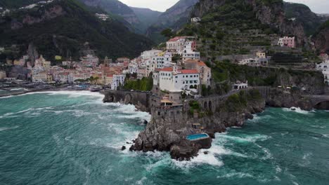 Aerial-Establishing-Orbit-of-Buildings-on-Cliffs-of-Amalfi-Coast,-Italy