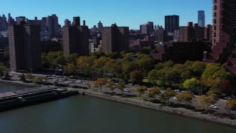 Fast-drone-pullback-and-pan-from-Harlem-to-downtown