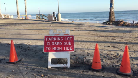 Beach-side-parking-lot-full-of-mud-and-orange-cones