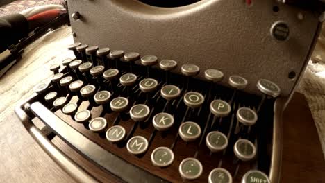Panning-shot-across-old-typewriter-keyboard