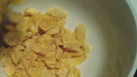 Pouring-Cornflakes-into-a-bowl