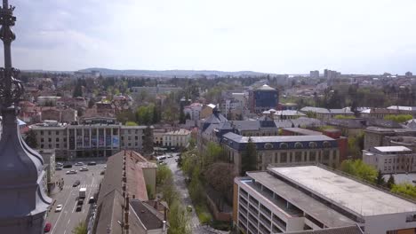 Aerial-Drone-Shot-Pulling-Up-to-Reveal-the-Vast-and-Beautiful-City-Scape-of-Cluj-Napoca-Romania