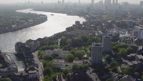Elevated-aerial-pan-up-of-central-and-greater-london-featuring-the-Thames-river