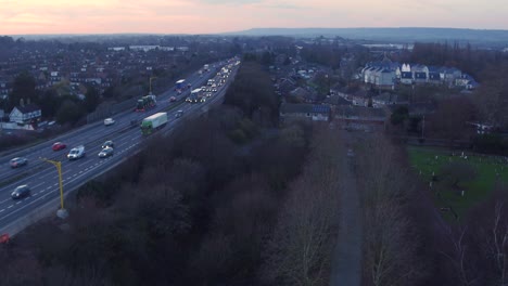 Aerial-view-of-M20-during-rush-hour-at-sunset-near-j5-Aylesford,-Kent