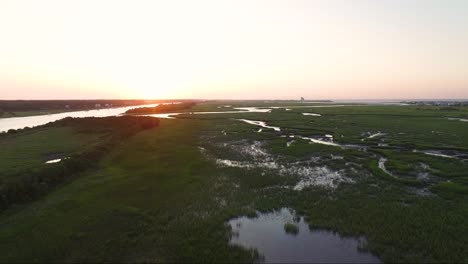 Aerial-view-of-wetlands-near-Sunset-Beach-NC-during-sunrise