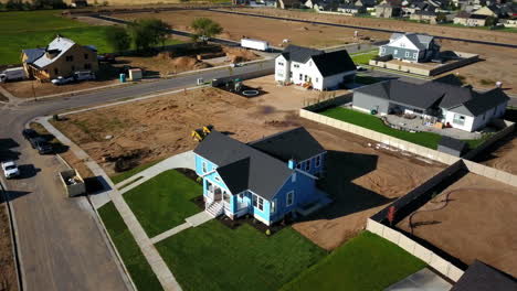 A-drone-shot-spinning-around-the-finishing-touches-on-a-brand-new-house-that-had-just-been-built-in-the-suburbs