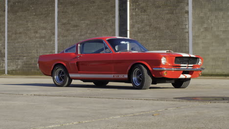 Beautiful-red-American-old-timer-classic-Ford-Mustang-Fastback