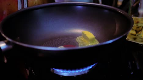 Butter-melting-in-pan-on-gas-stove