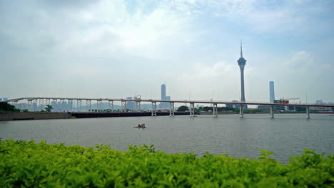 Landmark-of-Macau,-China-famous-tower-seen-from-across-the-river