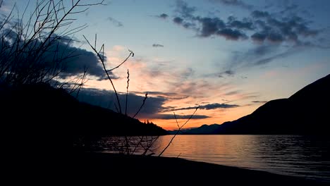 inspiration-sunset-on-lake-with-mountains-in-background