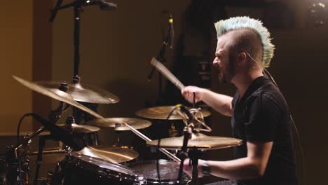 Drummer-performing-in-a-studio-setting
