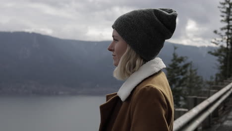 A-girl-gazes-out-at-a-gorge-from-a-scenic-viewpoint