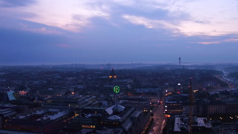 Aerial-descent-of-Stockholm-city-center-in-the-evening