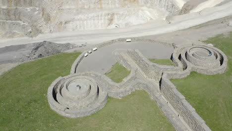 An-aerial-close-up-view-of-the-Coldstones-Cut-public-artwork-near-Pateley-Bridge-with-an-asphalt-quarry-in-the-background