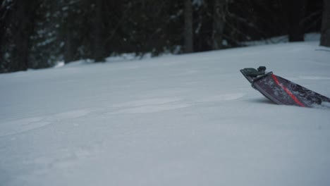 Slow-motion,-ski-moving-through-freshly-fallen-snow-in-Colorado-winter