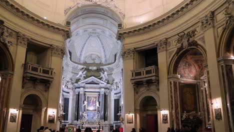 Pan-shoot-inside-church-of-the-artists-with-few-tourists-in-people’s-square-in-Rome