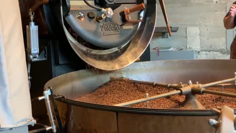 Fresh-aromatic-coffee-beans-going-through-the-process-of-roasting-at-a-Starbucks-Reserve-Roastery-in-Seattle-Washington