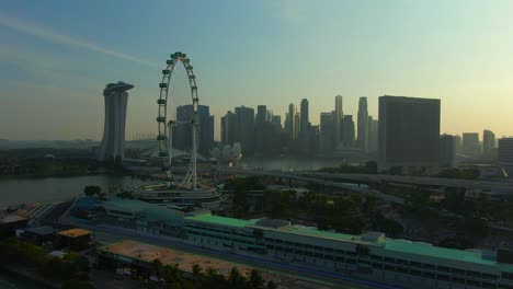 Aerial-Footage-of-Singapore-Cityscape-featuring-famous-tourist-attractions-in-Marina-Bay