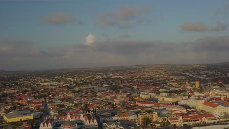 Aerial-view-over-the-houses-in-the-city-Oranjestad-of-Aruba-with-a-blue-skies