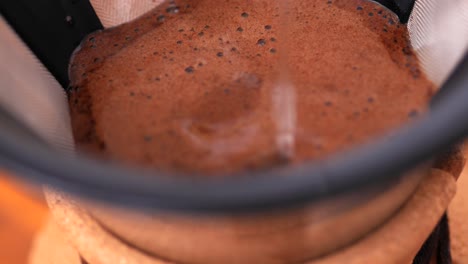 Kemex,-pouring-water-on-coffee,-extreme-close-up