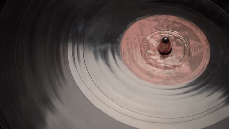 Ancient-vinyl-rotating-on-a-turntable.-Close-up