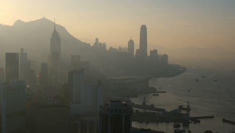 Hohe-Ansicht-Mit-Blick-Auf-Den-Hafen-Von-Victoria,-Einschließlich-Der-Insel-Hong-Kong-Und-Kowloon-Am-Späten-Nachmittag