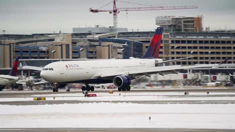 A-Delta-passenger-jet-moving-briskly-along-the-runway-soon-after-landing