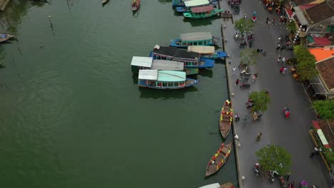 Aerial-view-of-Hoi-An-in-Vietnam-flying-over-boats
