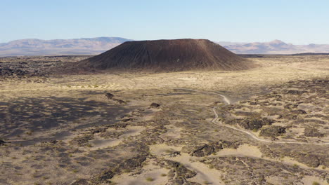 Aerial-view-of-the-Amboy-crater-with-its-lava-field-around-it
