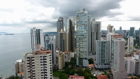 Aerial-drone-footage-of-buildings-in-Panama-City-in-front-of-the-sea