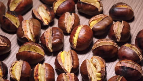 Roasted-chestnuts-rotating-on-wooden-background