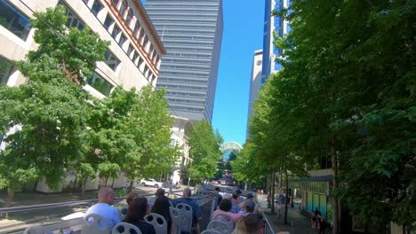 Driving-on-a-tourist-bus-through-Seattle-city-in-USA