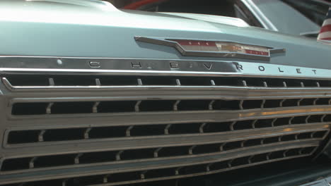 1964-Chevrolet-Impala-front-end-and-emblem,-Close-Up,-Slide-Left