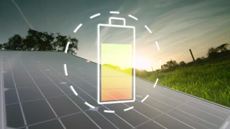 Battery-charge-indicators-symbol-fills-up-in-front-of-large-solar-panel-on-a-green-meadow
