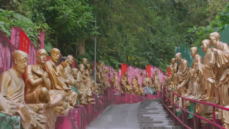 Tracking-out-of-buddha-statues-in-rows