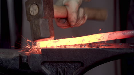 Hammering-Red-Hot-Metal-On-An-Anvil
