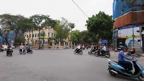 Motorcycles-along-the-streets-of-Hanoi-on-a-cloudy-afternoon