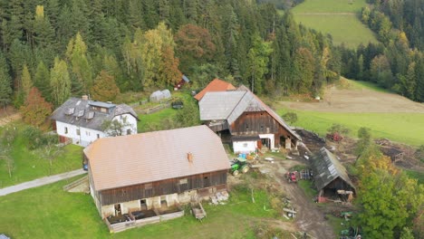Drone-view-of-old-wood-mill-infrastructure-buildings-at-Prevalje,-Slovenia