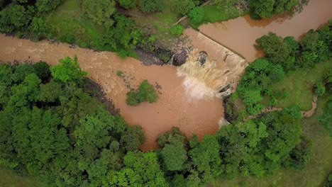 Muddy-Water-Chorro-De-La-Chorrera-Waterfall-In-Flood-Season-In-Panama,-Aerial