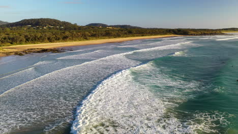 Beautiful-drone-shot-of-ocean-waves-crashing-at-Coffs-Harbour-Australia